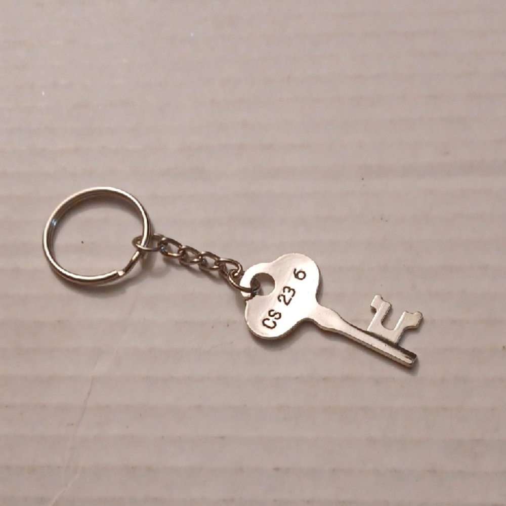 4/$40 New Silver Key Shaped Keychain